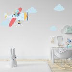 Αυτοκόλλητο τοίχου - Δεινοσαυράκι σε αεροπλανάκι και 4 συννεφάκια